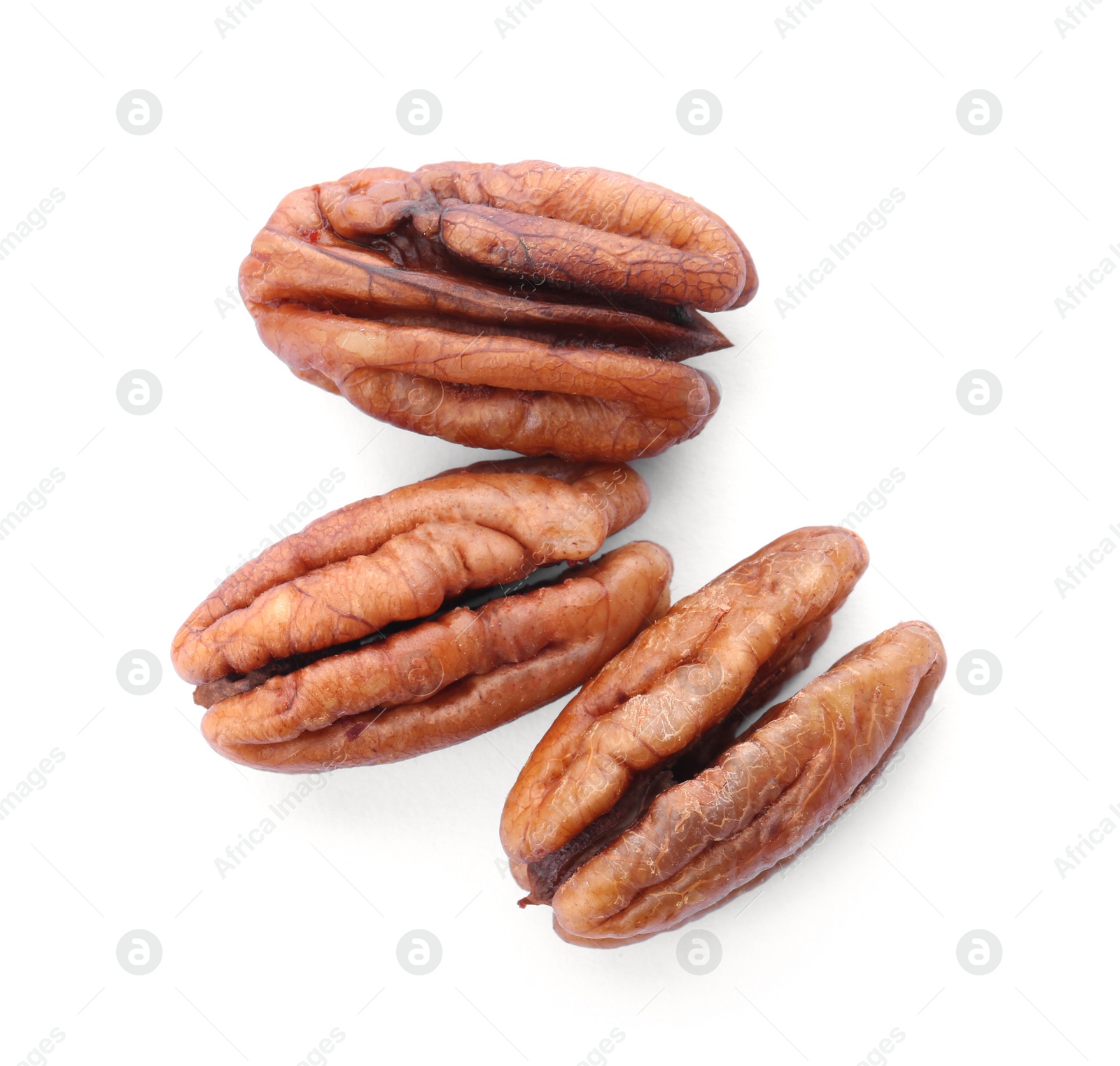 Photo of Shelled pecan nuts on white background, top view