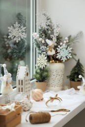 Beautiful window sill decorated for Christmas indoors