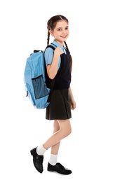 Photo of Full length portrait of cute girl in school uniform with backpack on white background