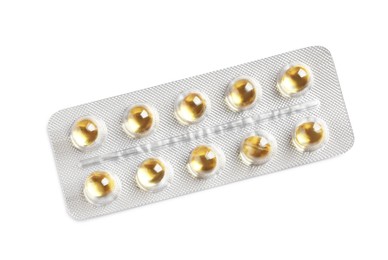 Photo of Blister with bright pills isolated on white, top view