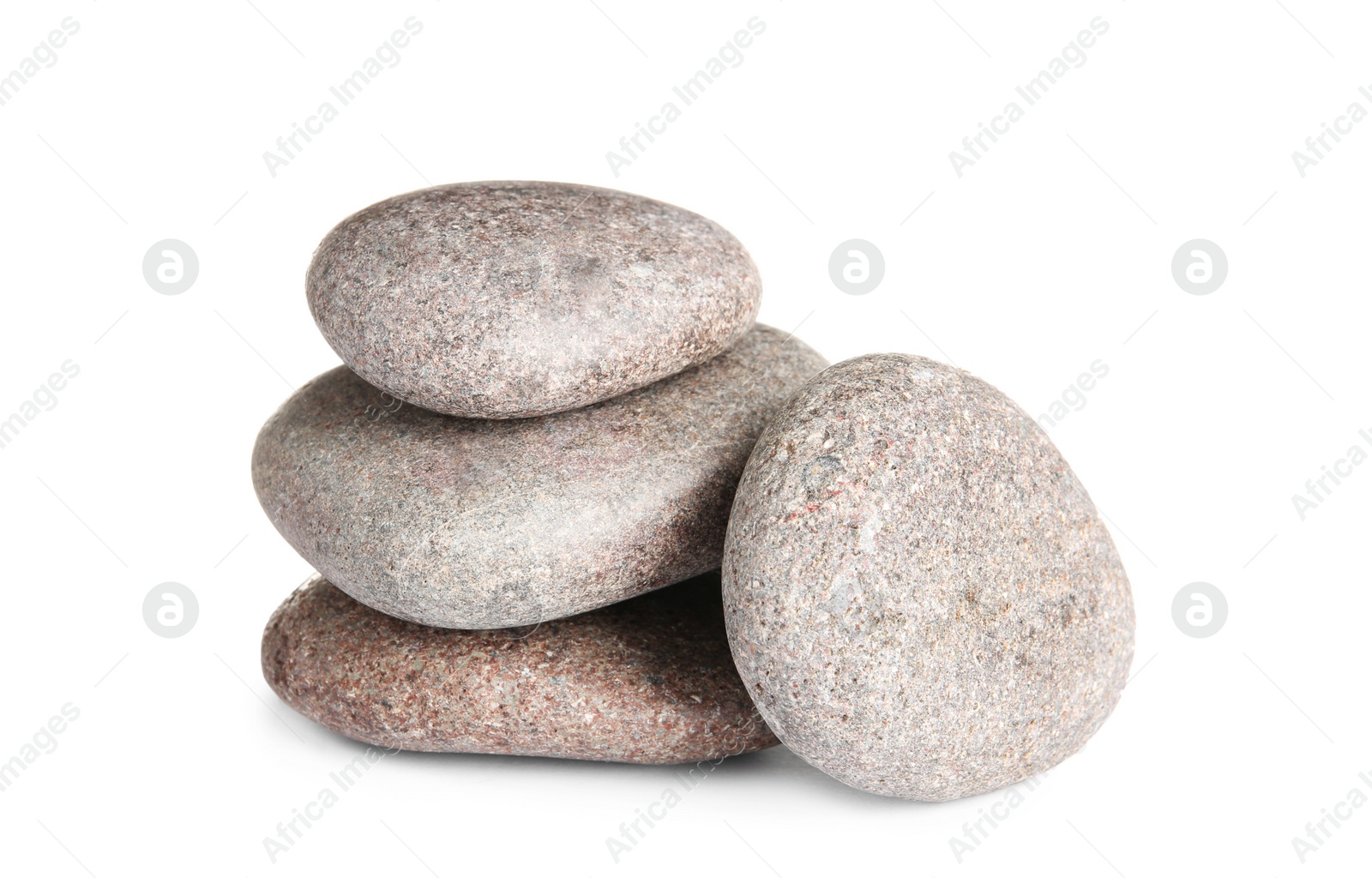 Photo of Stack of zen spa stones on white background