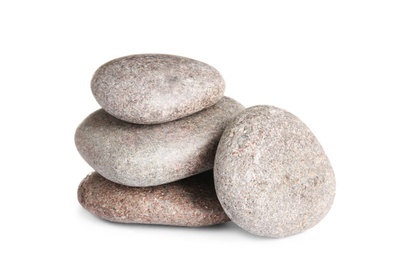 Photo of Stack of zen spa stones on white background