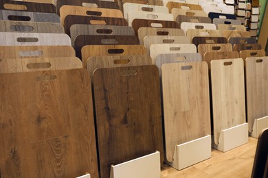 Many different samples of wooden flooring in store