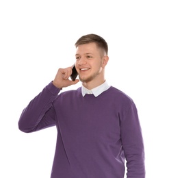 Handsome young man talking by phone on white background