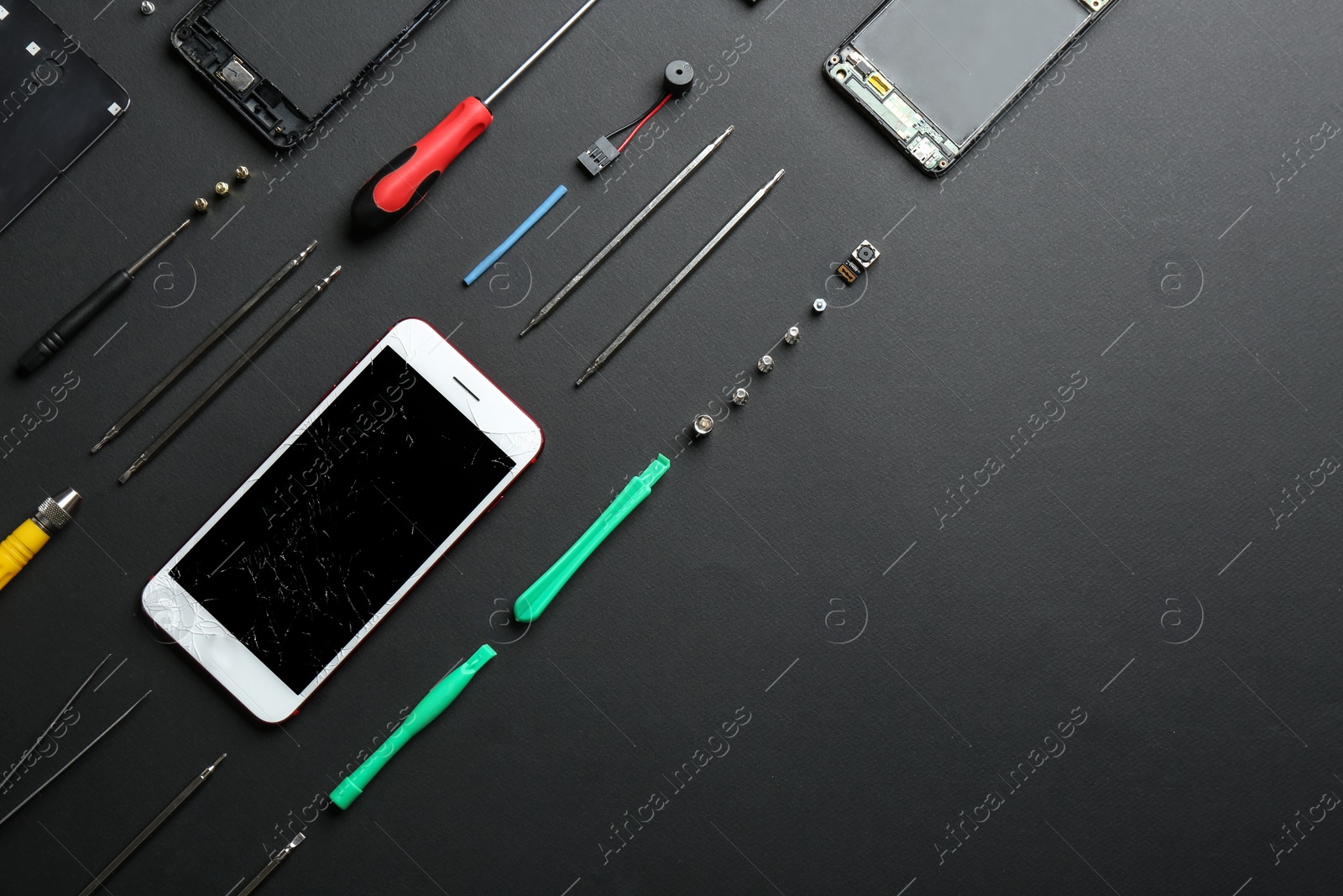 Photo of Broken mobile phone and repair tools on color background, flat lay. Space for text