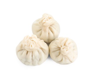 Three tasty khinkali (dumplings) isolated on white, top view. Georgian cuisine