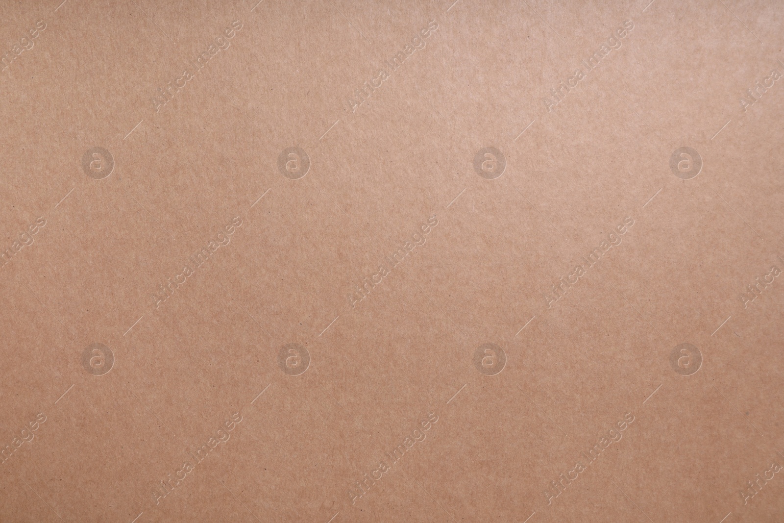 Photo of Texture of kraft paper bag as background, closeup