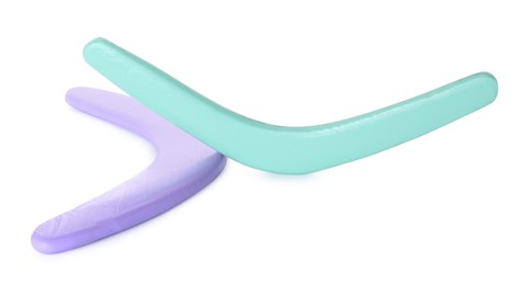 Photo of Purple and turquoise boomerangs on white background