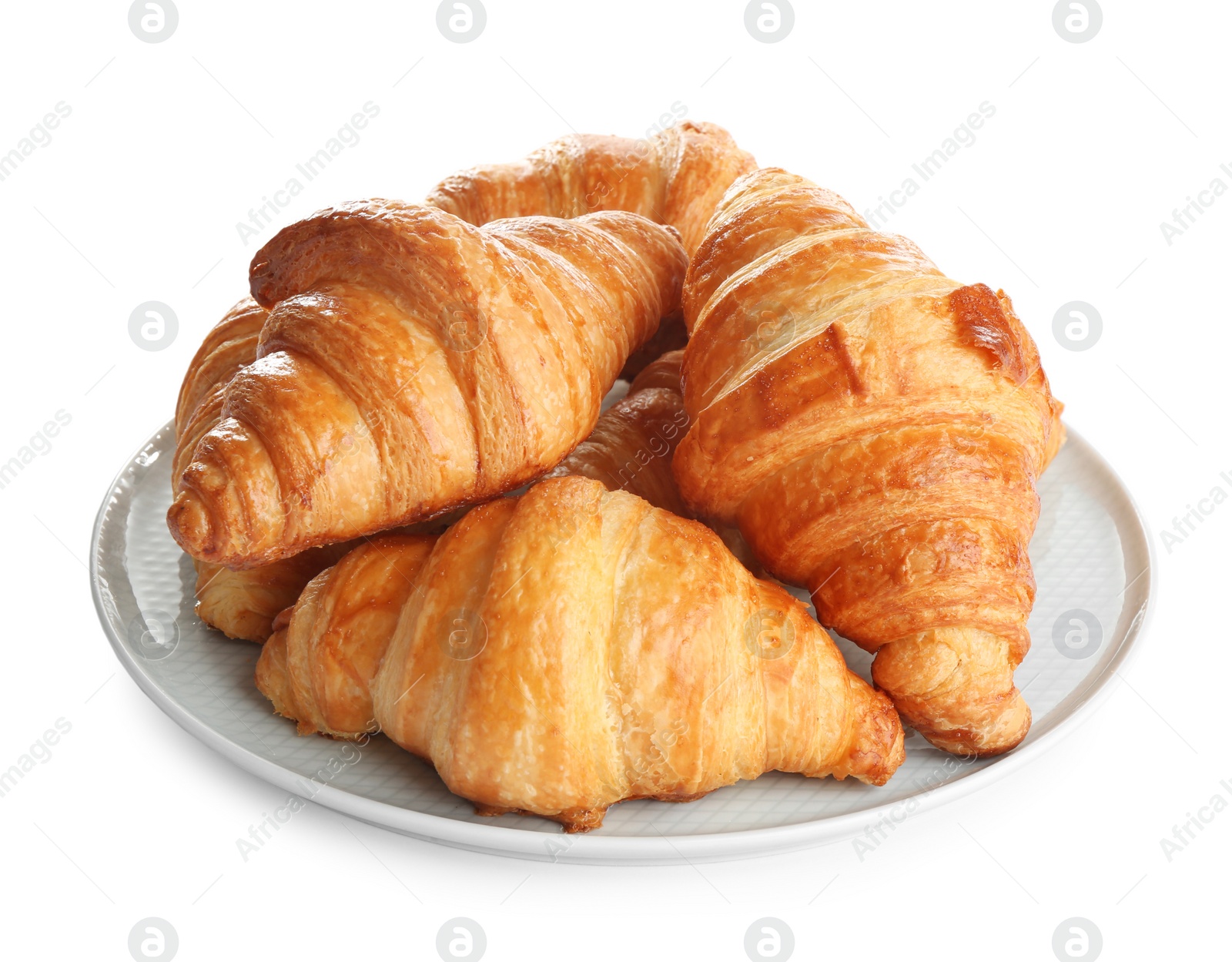 Photo of Plate with tasty croissants on white background. French pastry