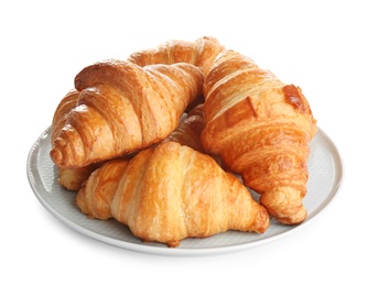 Photo of Plate with tasty croissants on white background. French pastry