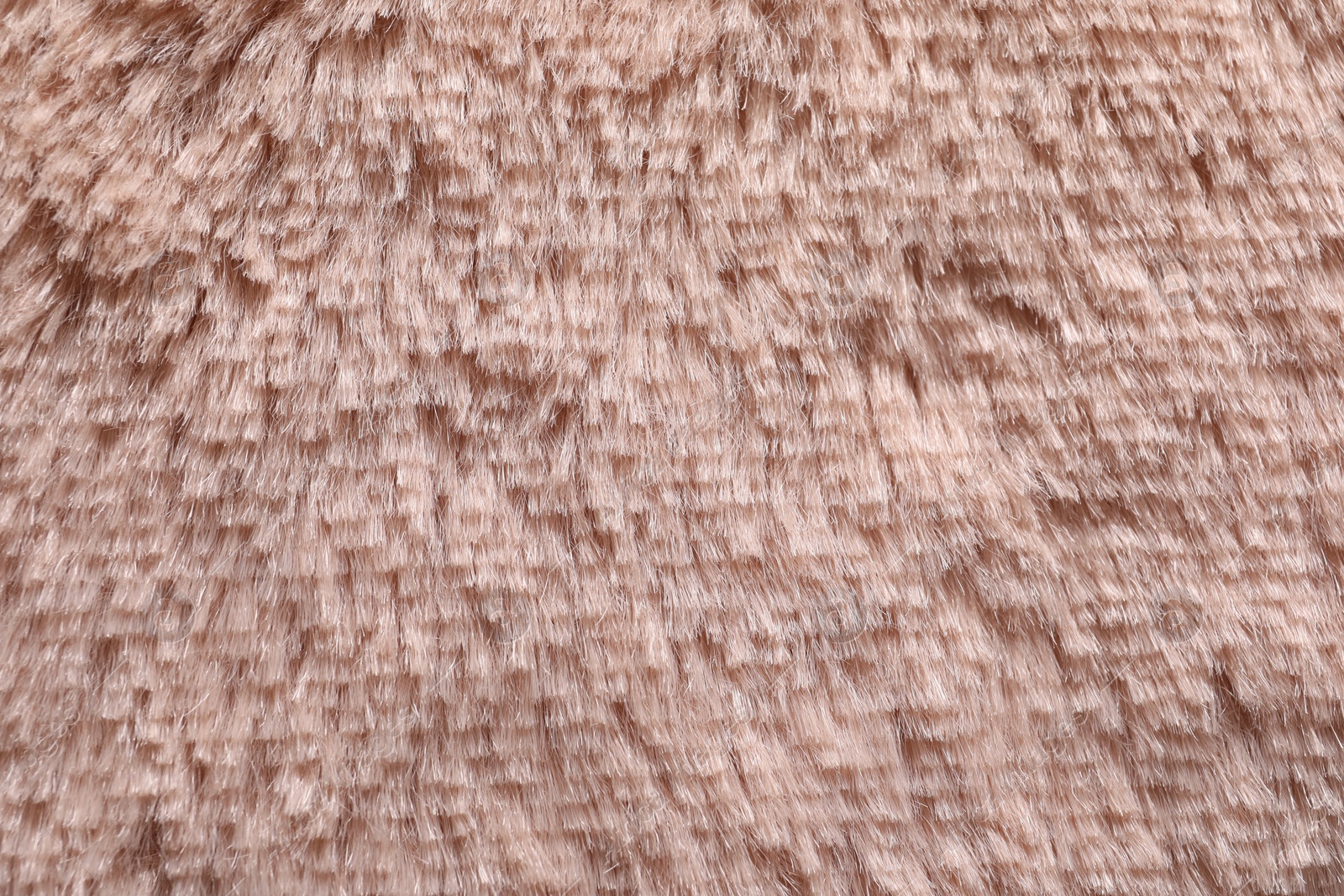 Photo of Texture of pink faux fur as background, closeup