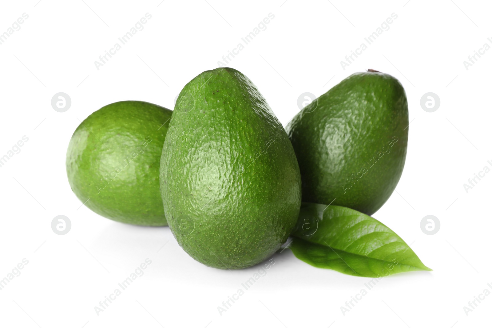 Photo of Tasty fresh ripe avocados isolated on white