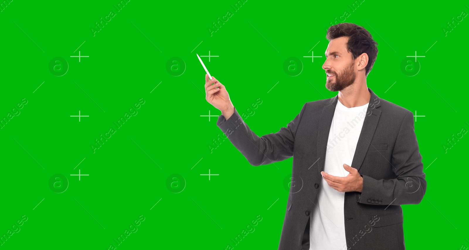 Image of Chroma key compositing. Broadcaster against green screen, banner design