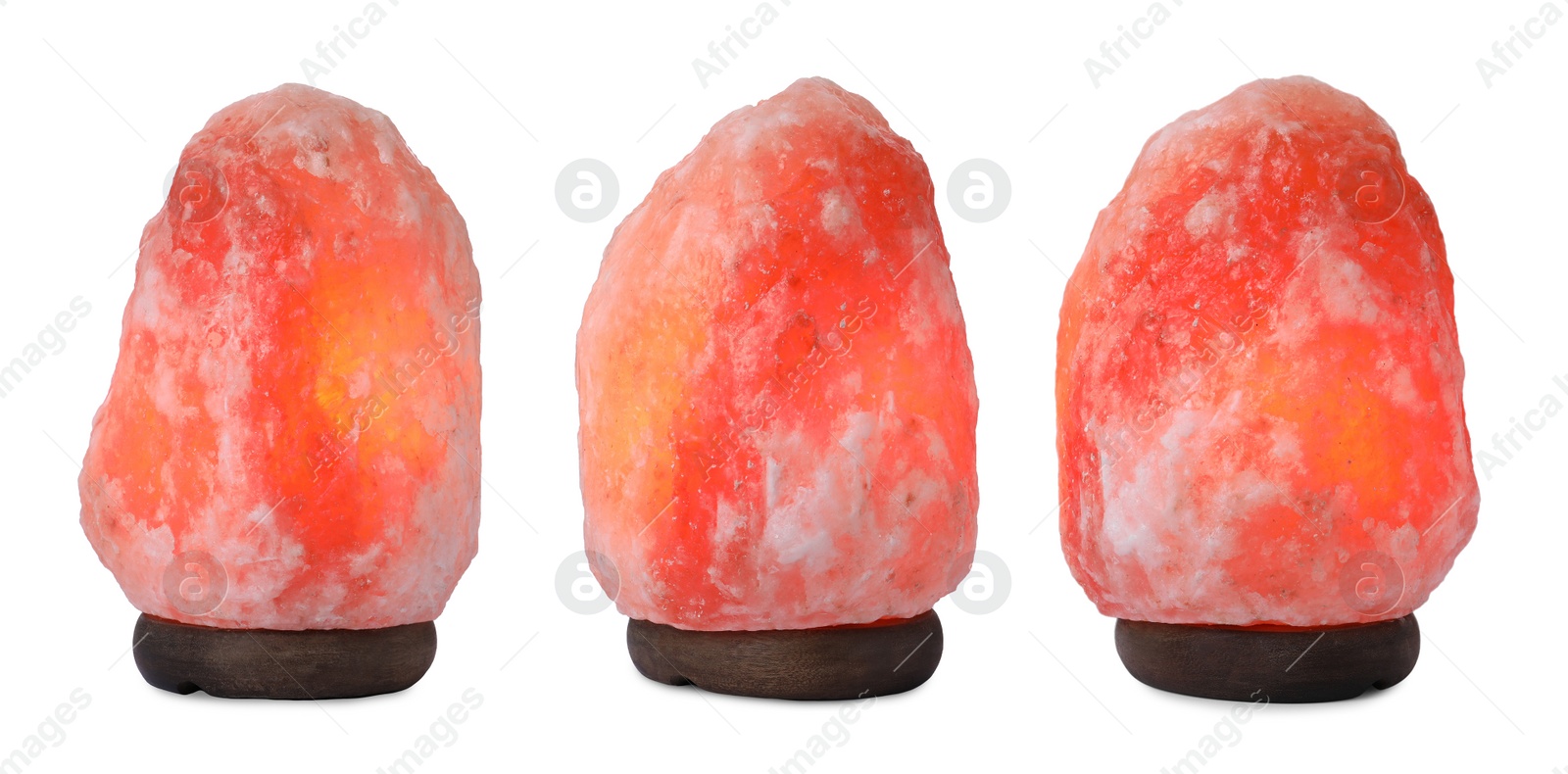 Image of Set with pink Himalayan salt lamps on white background. Banner design 