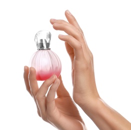 Photo of Young woman with perfume bottle on white background, closeup