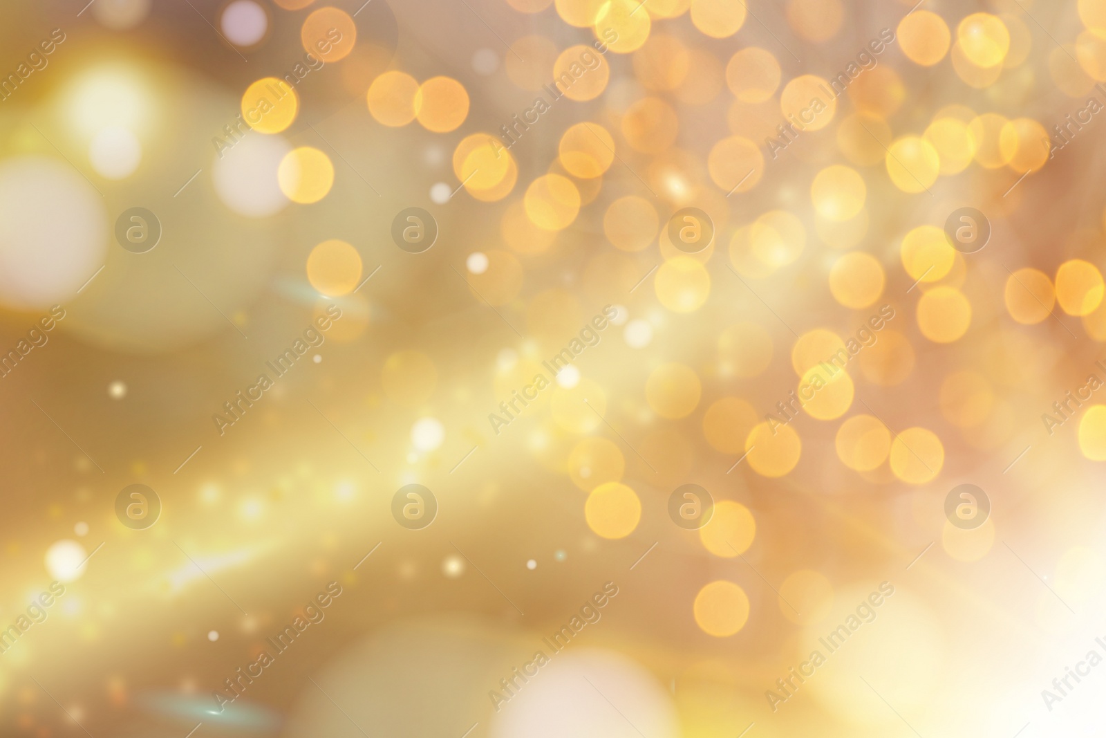 Image of Beautiful abstract background with defocused golden lights