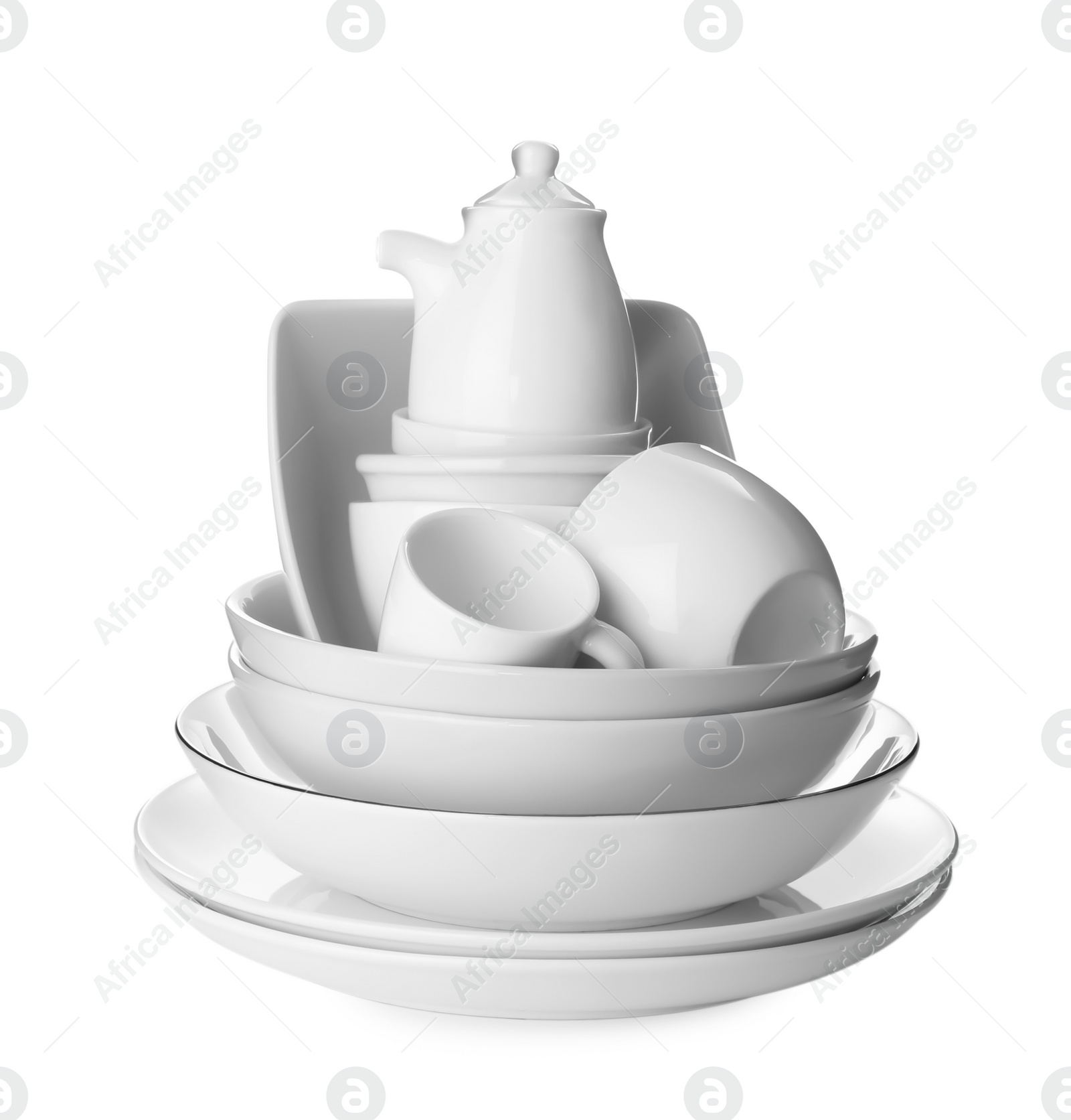 Photo of Set of clean dishes on white background