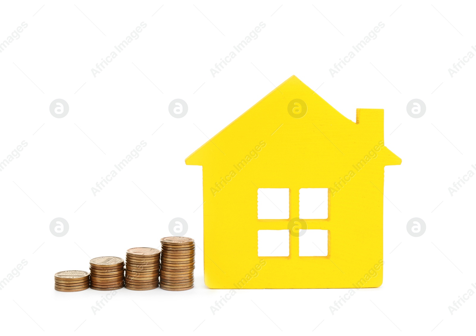 Photo of House model and coins isolated on white