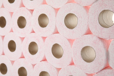 Many rolls of toilet paper as background