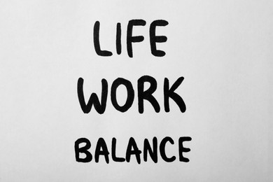 Photo of Life, Work, Balance written on white background, top view