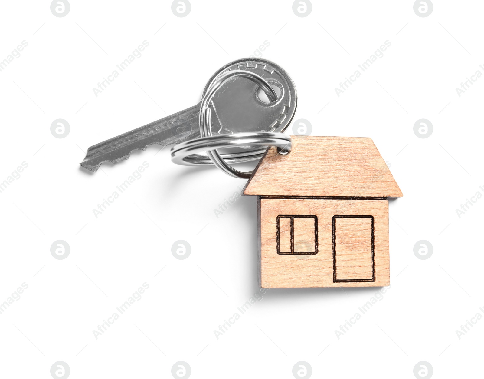 Photo of House key with trinket on white background, top view