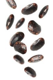 Image of Many black beans falling on white background. Vegan diet 