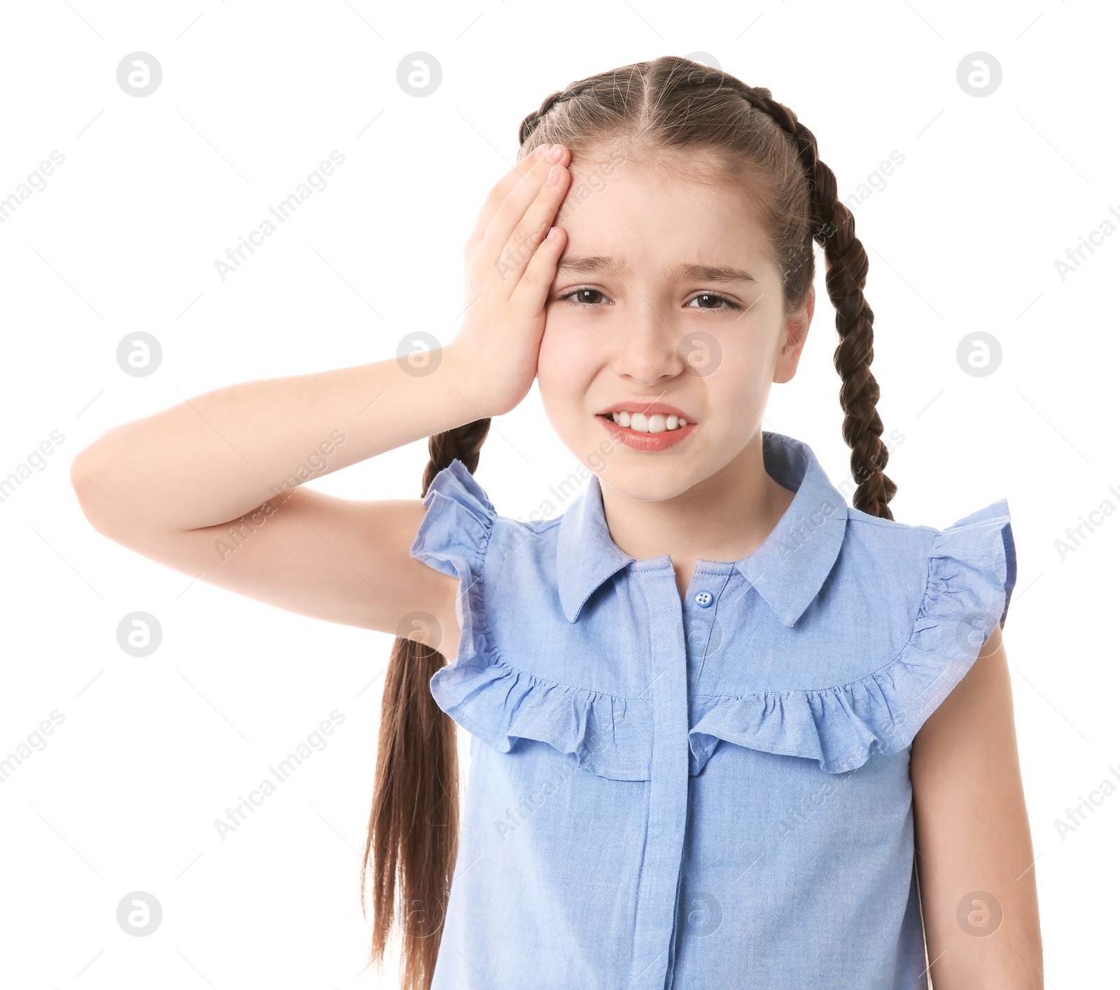 Photo of Little girl suffering from headache on white background