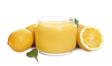 Delicious lemon curd in glass jar, fresh citrus fruits and green leaves isolated on white