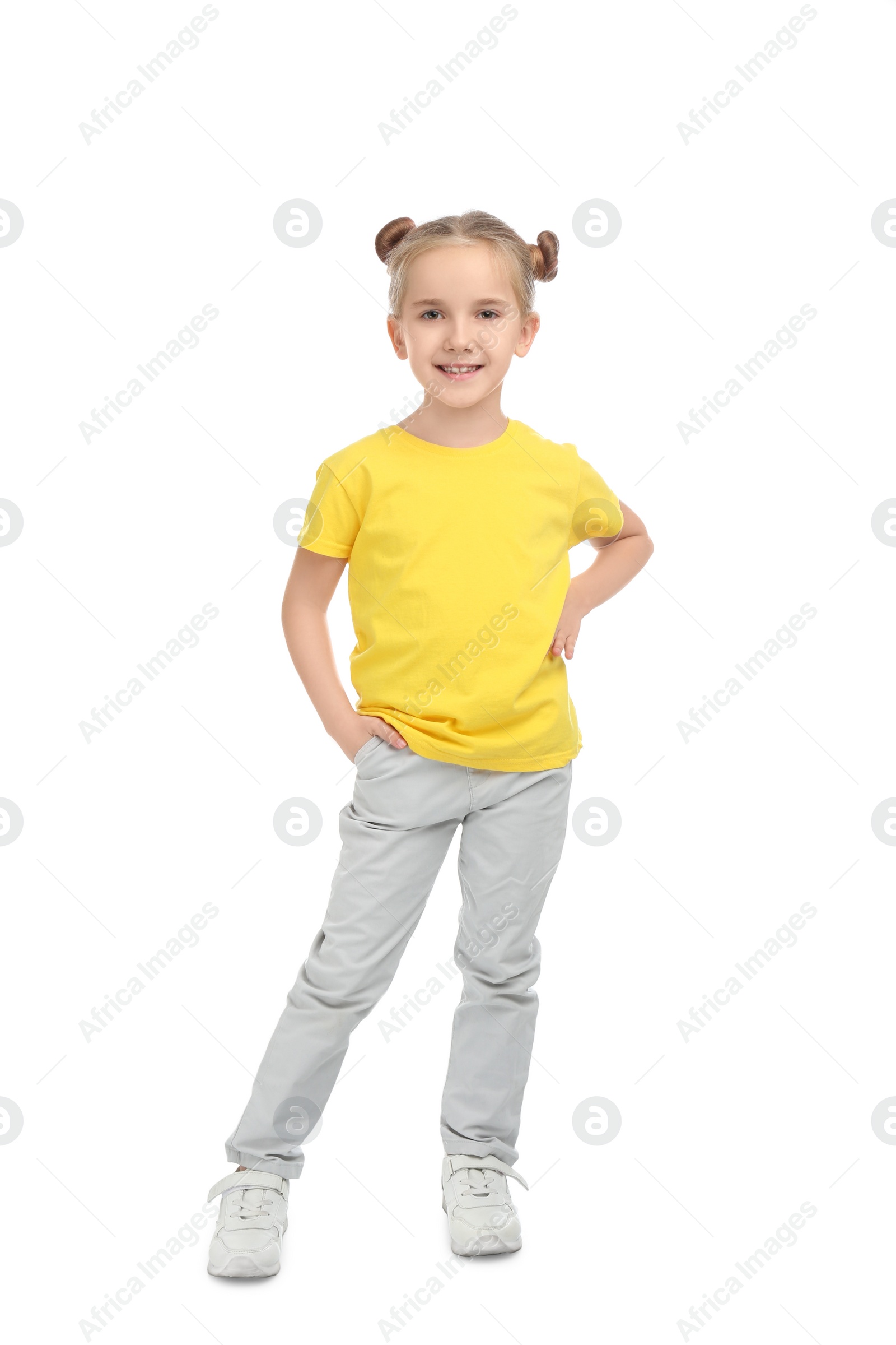 Photo of Cute little girl posing on white background