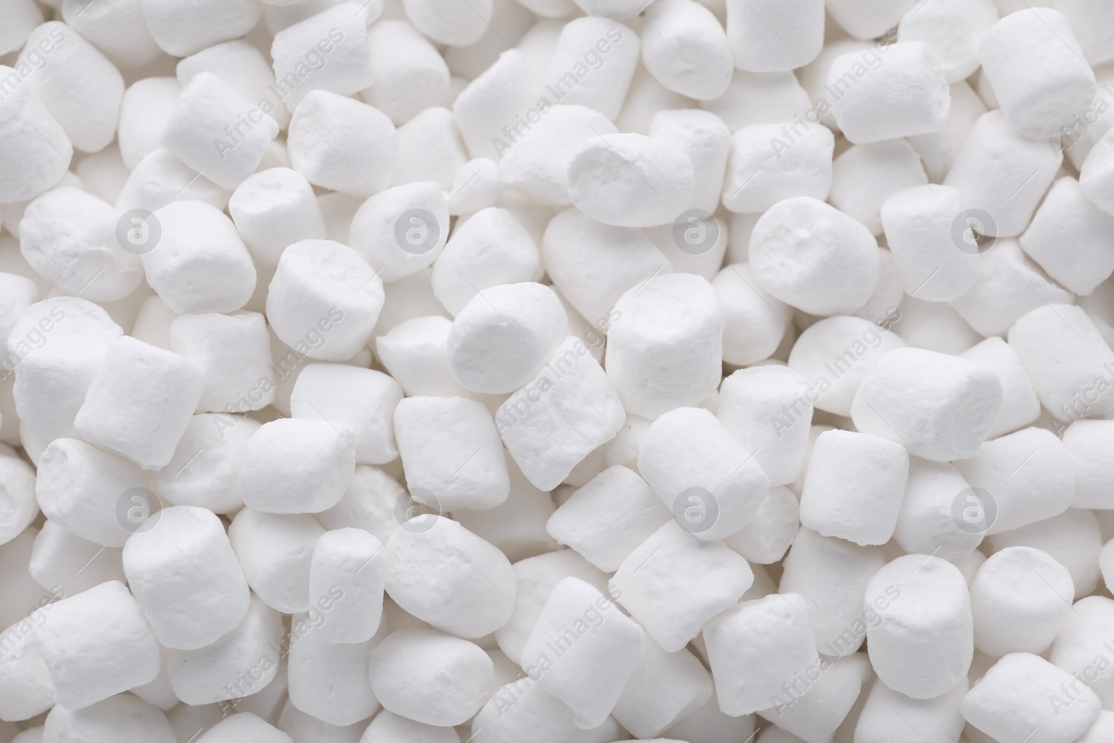 Photo of Many delicious sweet marshmallows as background, closeup