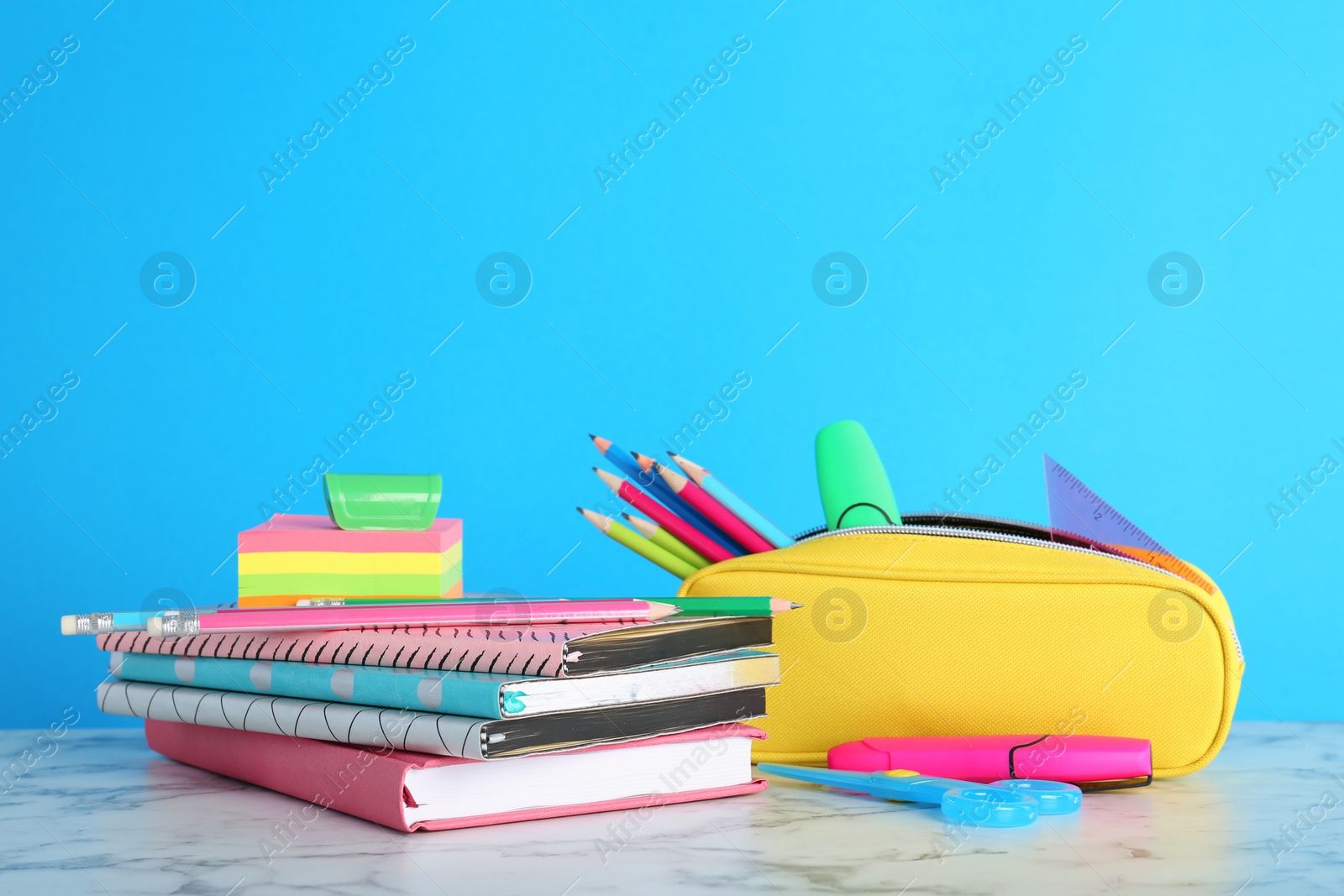 Photo of Different colorful stationery on table. Back to school