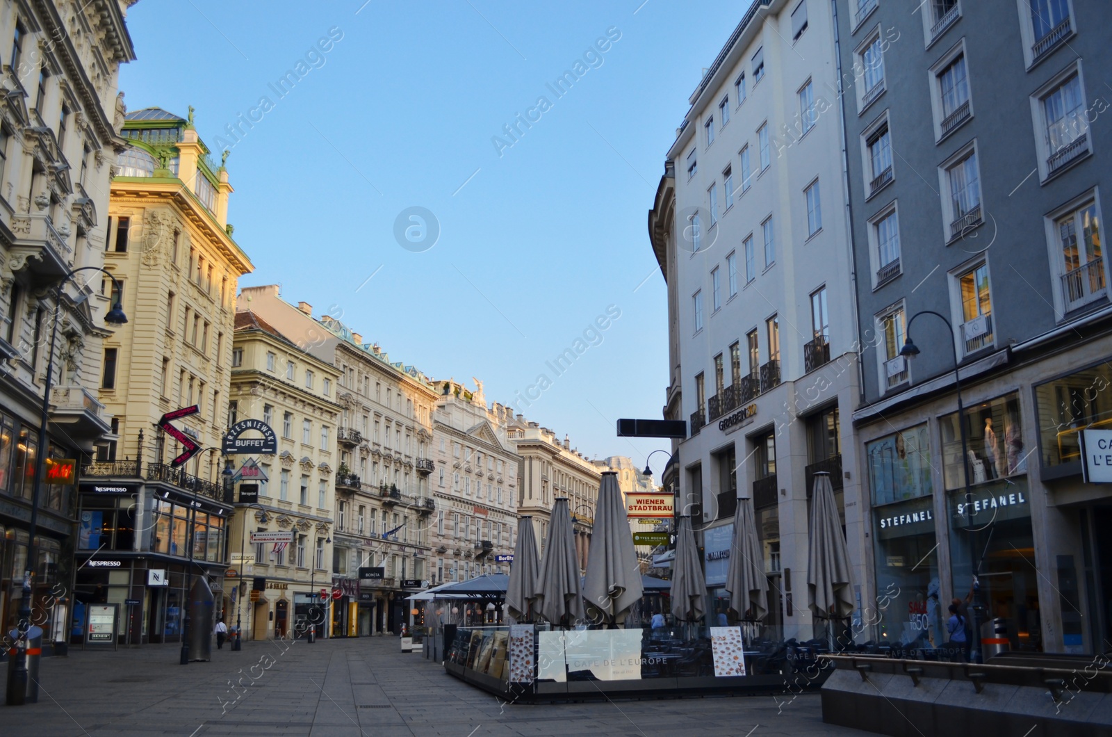 Photo of VIENNA, AUSTRIA - JUNE 18, 2018: Open-air cafe on city street