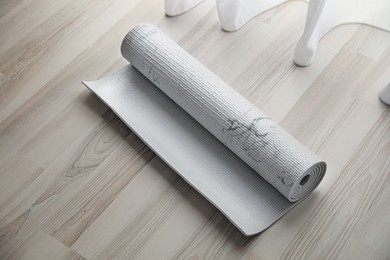 Karemat or fitness mat on wooden floor