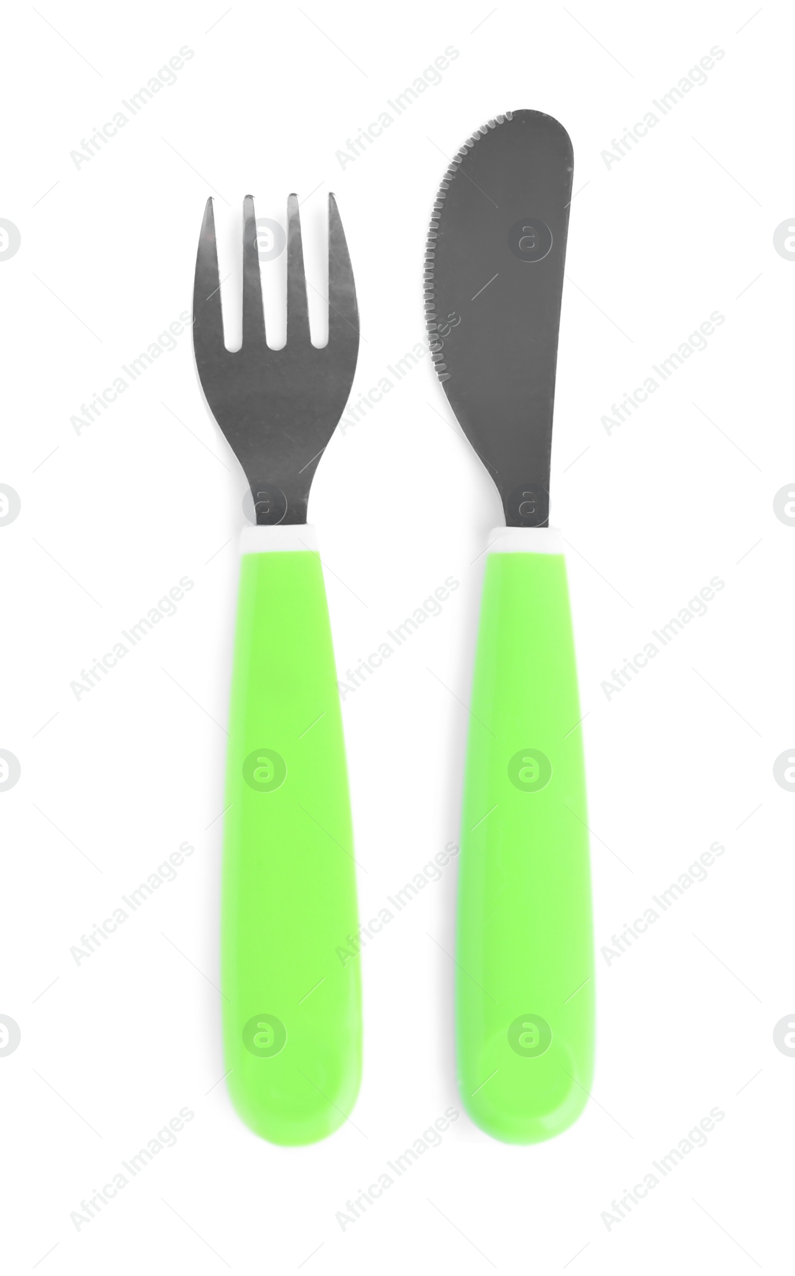 Photo of Cutlery with plastic handles isolated on white, top view. Serving baby food