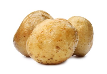 Photo of Tasty whole baked potatoes on white background