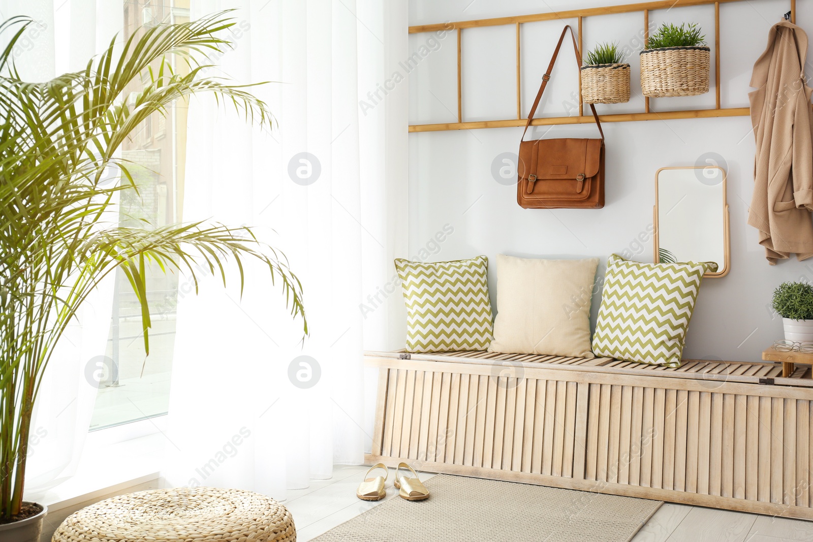 Photo of Cozy hallway interior with new stylish furniture