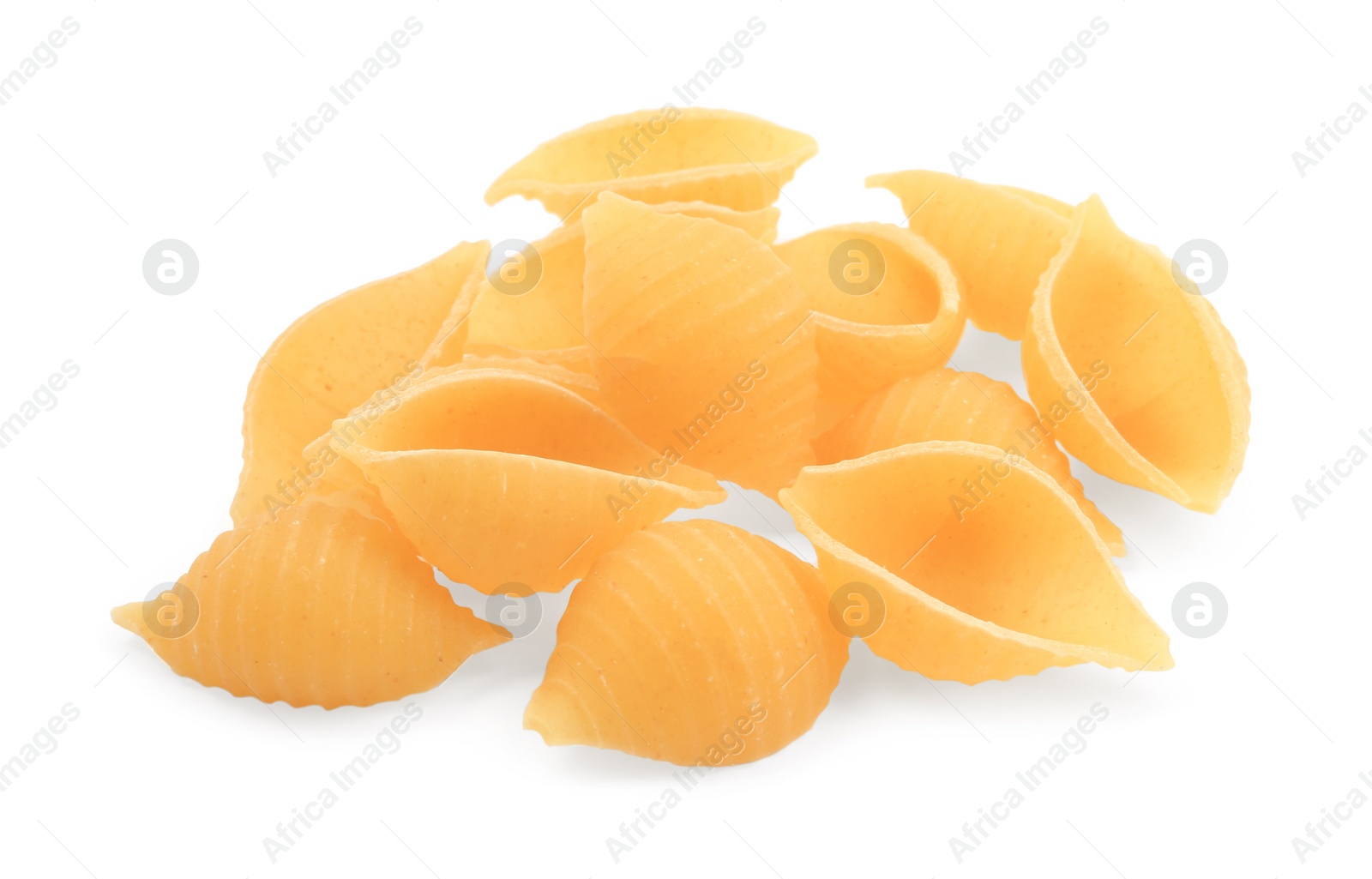 Photo of Pile of raw conchiglie pasta isolated on white