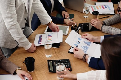 Photo of Businesspeople having meeting in office, closeup. Management consulting