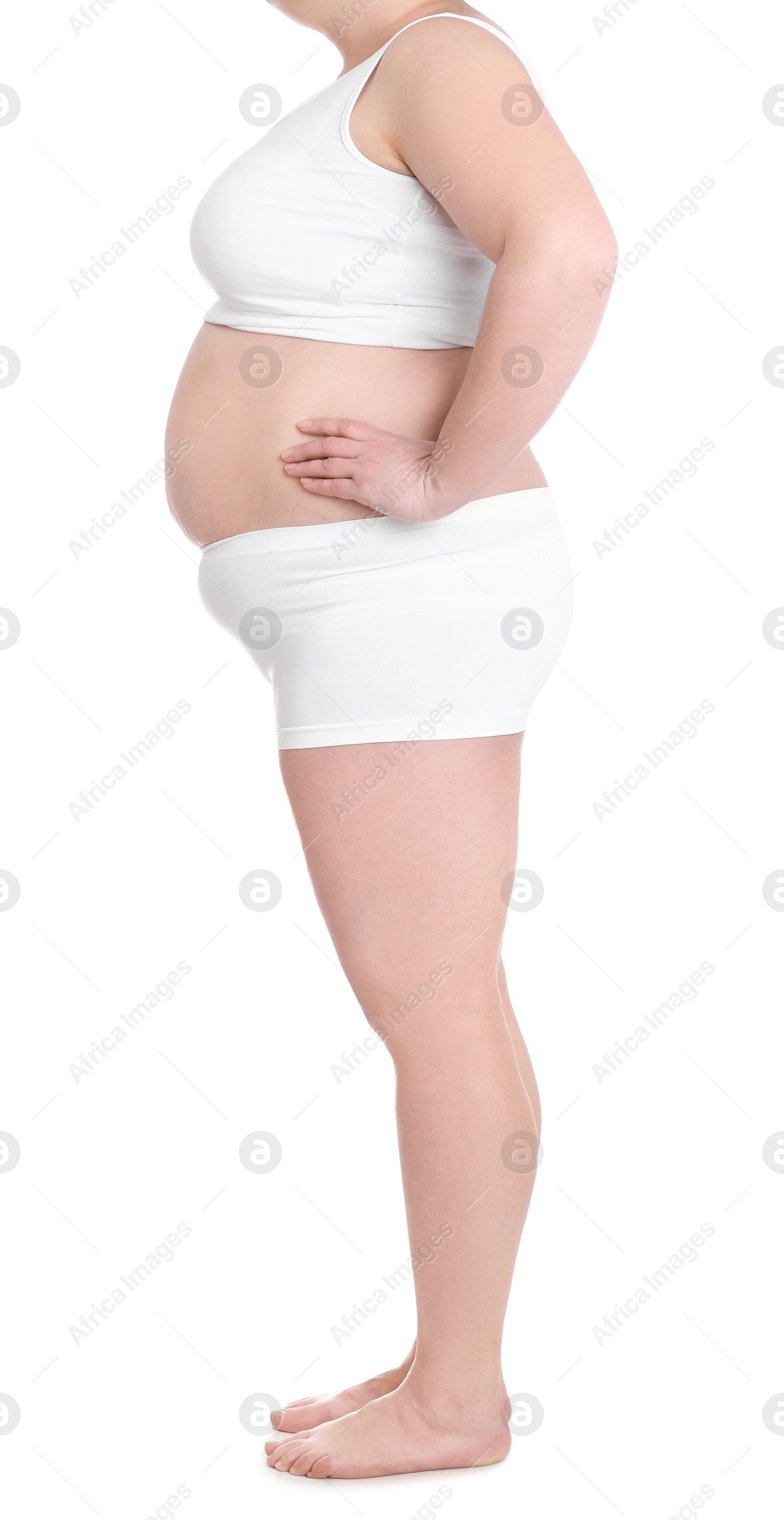 Photo of Overweight woman on white background, closeup. Weight loss