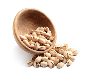 Organic pistachio nuts and wooden bowl on white background