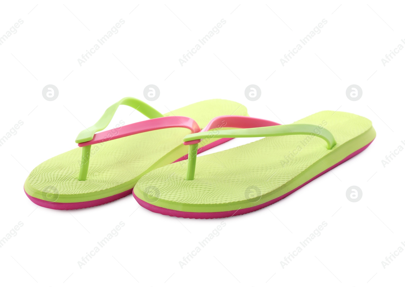 Photo of Pair of stylish green flip flops isolated on white. Beach object