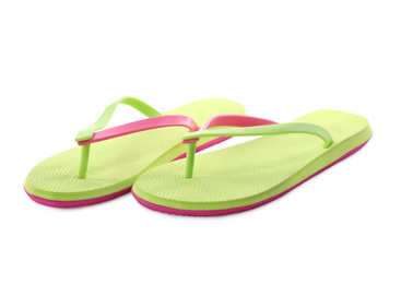 Pair of stylish green flip flops isolated on white. Beach object