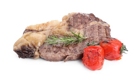 Photo of Piece of delicious grilled beef meat, rosemary and tomatoes isolated on white