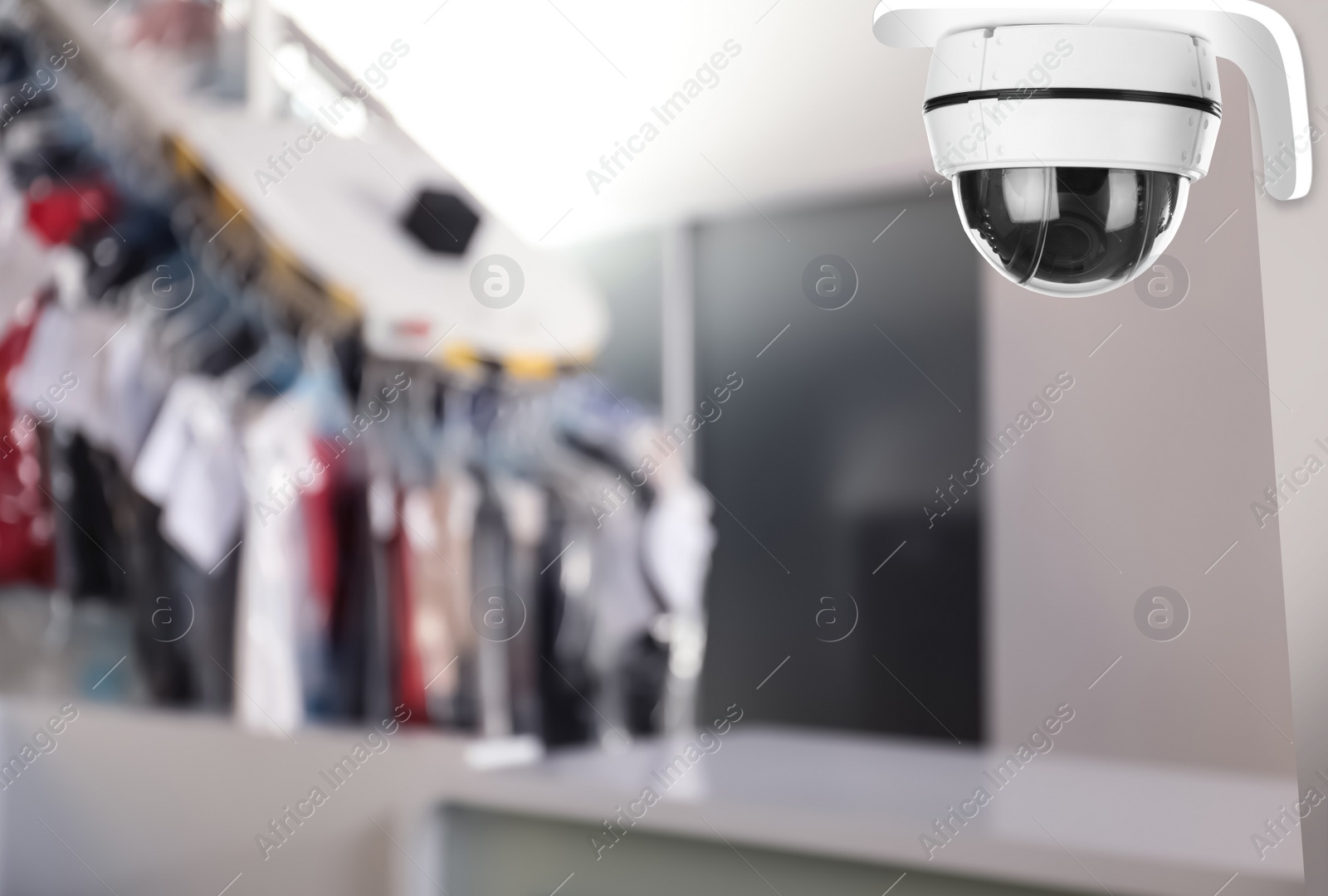 Image of Modern CCTV security camera at dry-cleaner's. Guard equipment