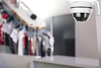 Image of Modern CCTV security camera at dry-cleaner's. Guard equipment