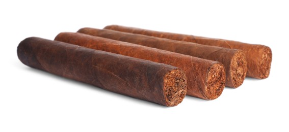 Photo of Cigars wrapped in tobacco leaves isolated on white