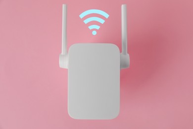 Image of New modern repeater and Wi-Fi symbol on pink background