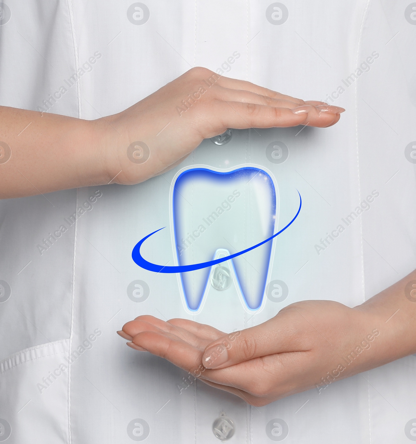 Image of Dentist demonstrating virtual image of healthy tooth on light blue background, closeup
