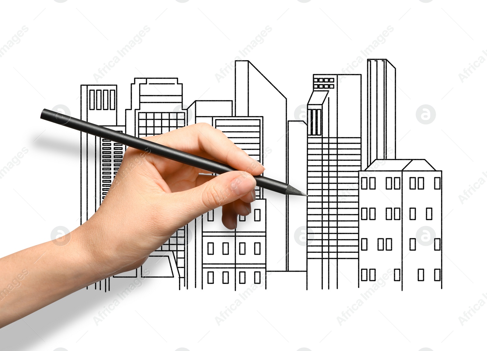 Image of Woman drawing sketch of cityscape with graphite pencil on white paper, closeup