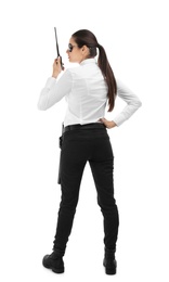 Photo of Female security guard using portable radio transmitter on white background